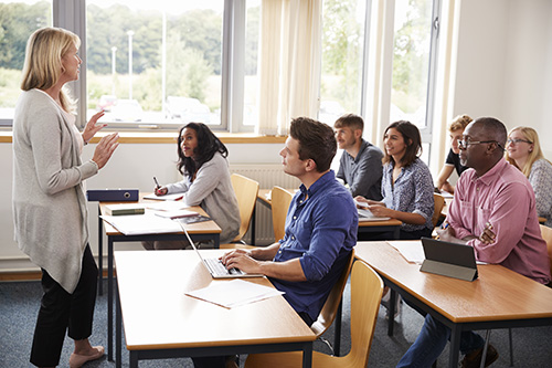 image of mature adults in a classroom