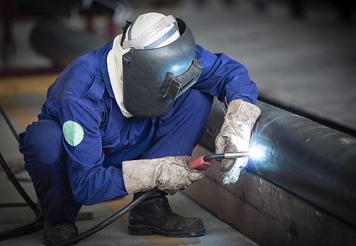 welder welding pipe
